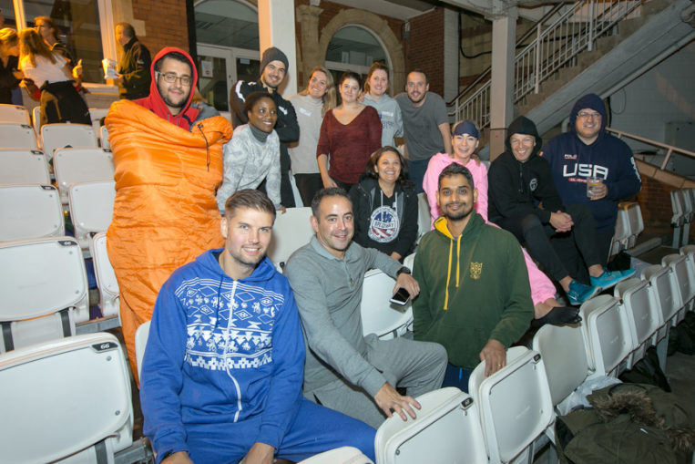 Group of people with sleeping bags