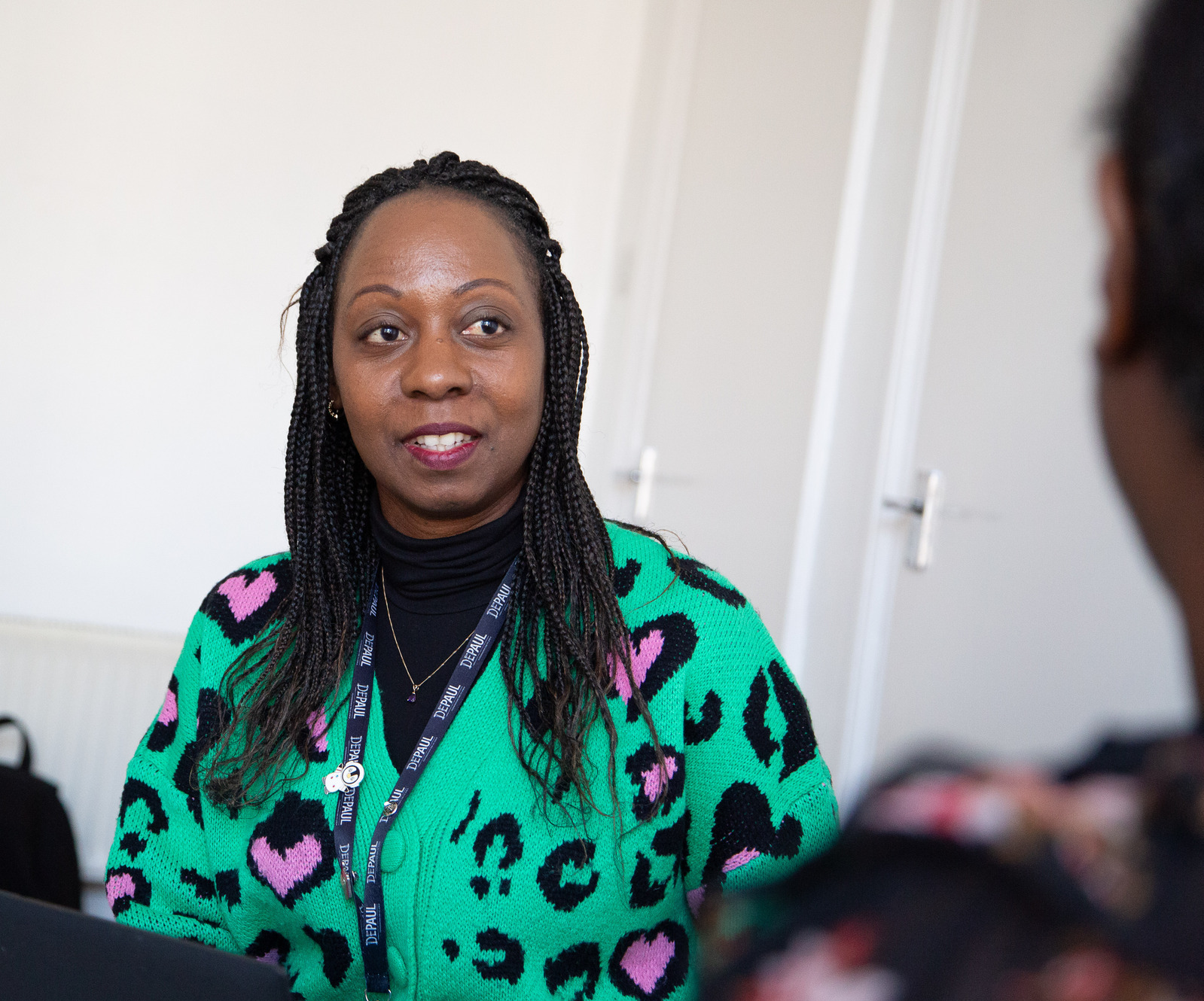 Depaul UK staff member talking to provider