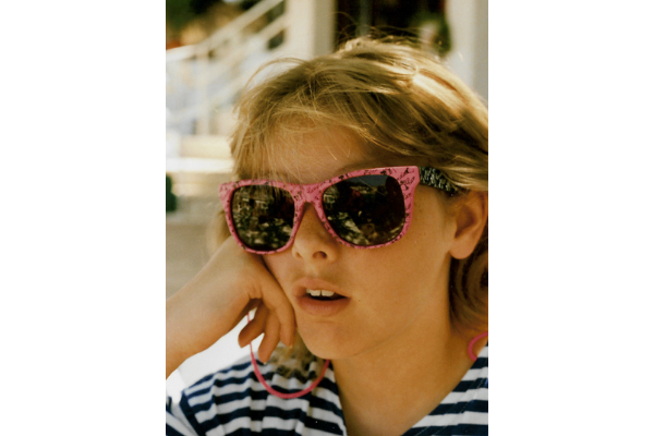Woman in pink sunglasses