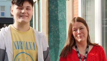 Depaul staff and young person standing outside a house smiling