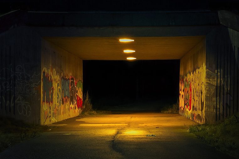 Tunnel with graffiti on the wall