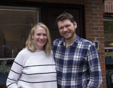 Katy and Will at their front door
