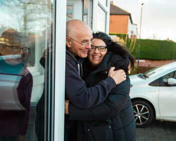 Client and Nightstop volunteer hugging