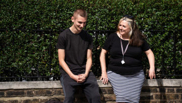 staff member and young person chatting