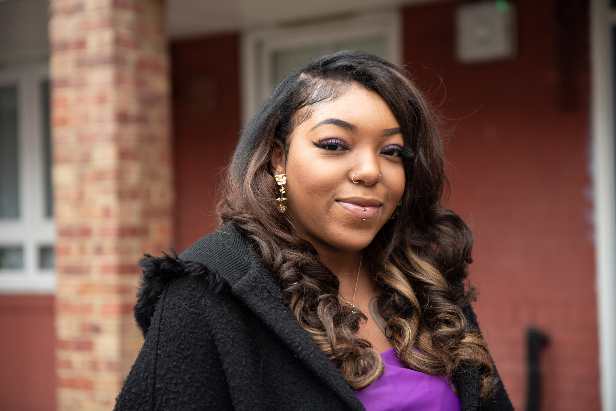 Young person smiling at the camera