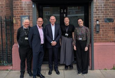 ComputerShare and Depaul UK staff outside of Depaul UK offices