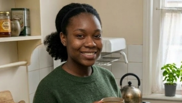 Abi stood in the kitchen